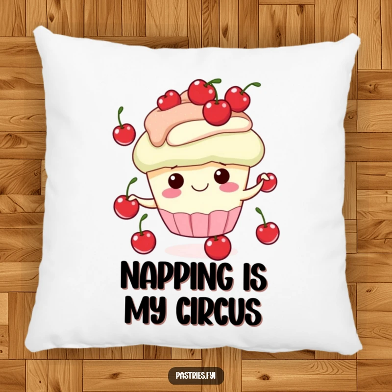 Funny pillow design of a cheerful cupcake character juggling red cherries, providing comfort and a humorous decorative touch.
