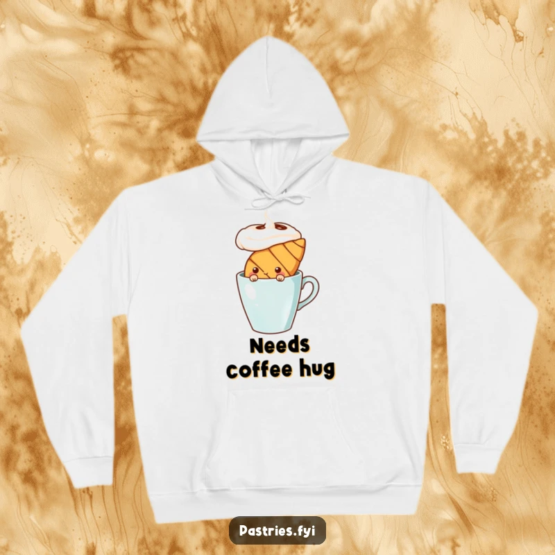 Funny shy croissant character peeking behind a giant coffee cup, depicted on a soft hoodie. Perfect for cozy, introverted days.
