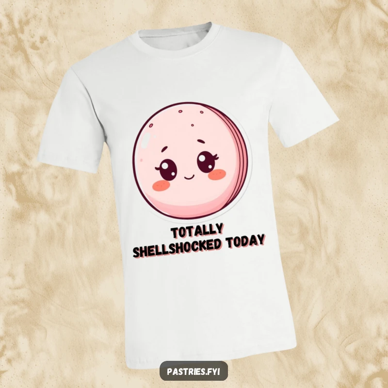 Funny t-shirt graphic of a macaron character with comically wide eyes and blushing cheeks, symbolizing utter surprise.